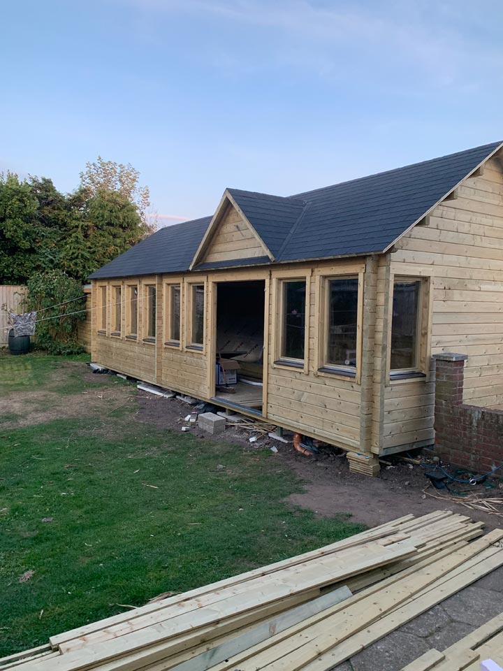 Back Garden Log Cabin Building Constructed for Company Office in Southbourne Bournemouth by Emerald Builders