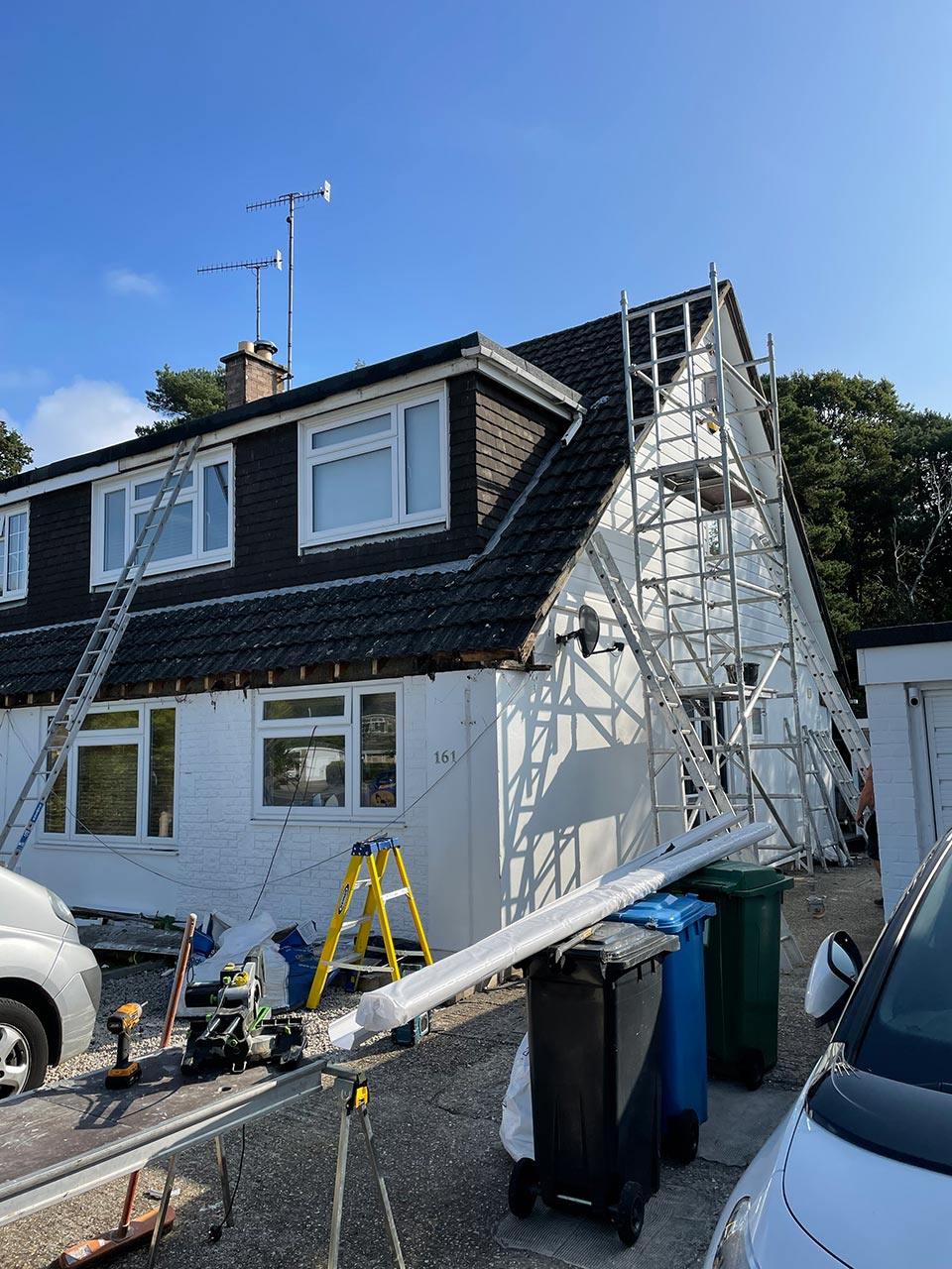 New PVC Gutters Installation in Process to House in Poole - Emerald Builders Ltd